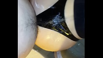 Me fucking my wife's big wet ass in latex strings in shower