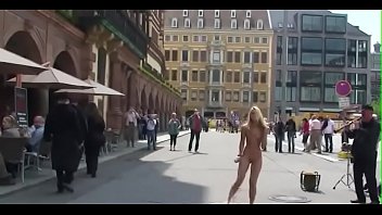 Nude woman dance at the street