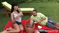 Brunette Aletta Shares a Hardcore Picnic with a Guy on a Red Blanket