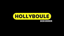 HOLLYBOULE - A transvestite fucks with dildos by two sluts